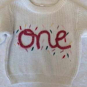 White Knit Sweater with Pink 'One' Design